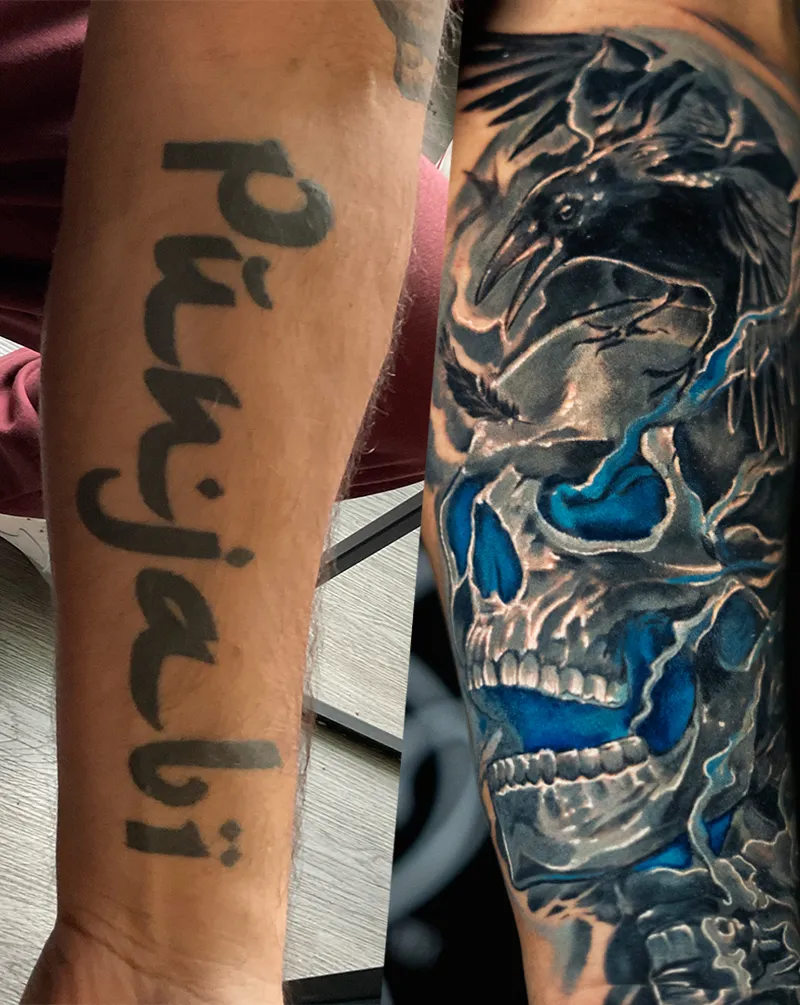 A cover-up on a forearm: a raven perched on a blue skull, over the faded lettering it replaced